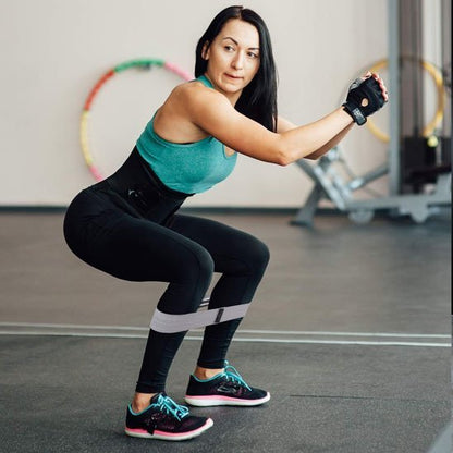 Elastique musculation​ femme élastique cheville fait squat